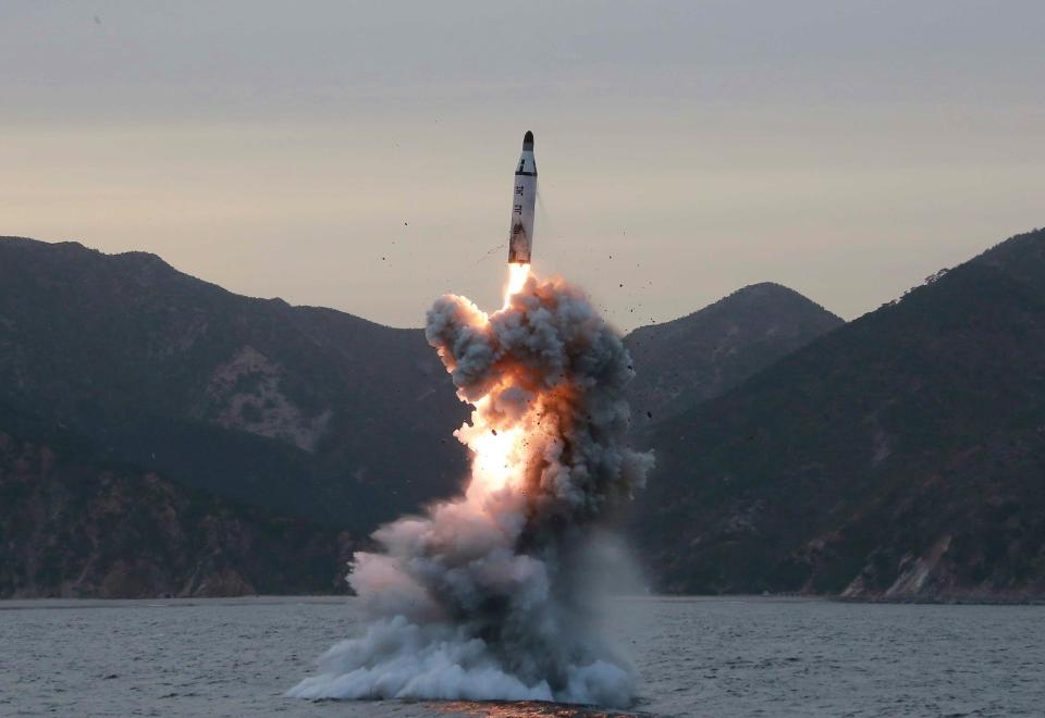  A photo released by North Korea of an 'test-fire of strategic submarine missile'