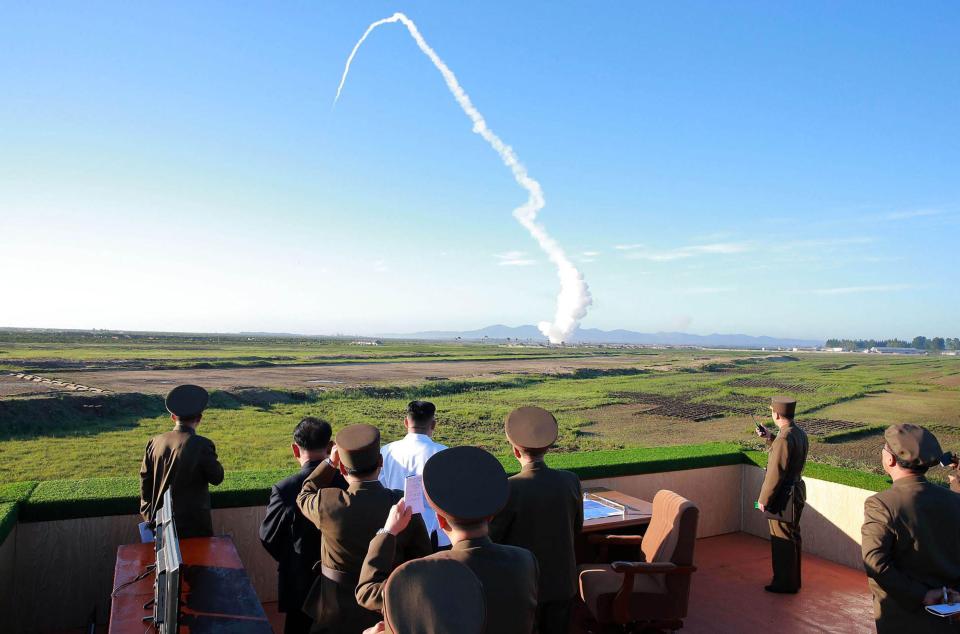  Kim oversees the test of a new anti-aircraft guided weapon system