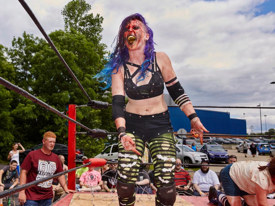  Sage Sin Supreme works the crowd at the IWA Mid-South Royal Weekend of Death