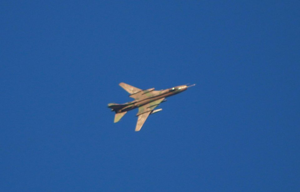 A fighter jet of the Assad regime is seen over besieged Eastern Ghouta