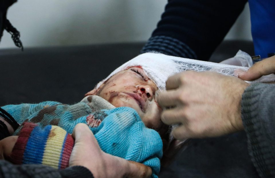 A wounded baby gets treatment at a sahra hospital after an airstrike carried out by the warplanes 
