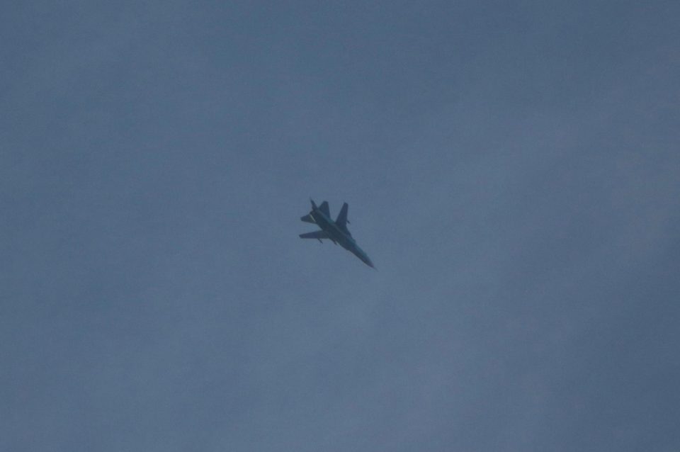 A fighter jet of Assad regime is seen over the de-escalation zone of Arbin town
