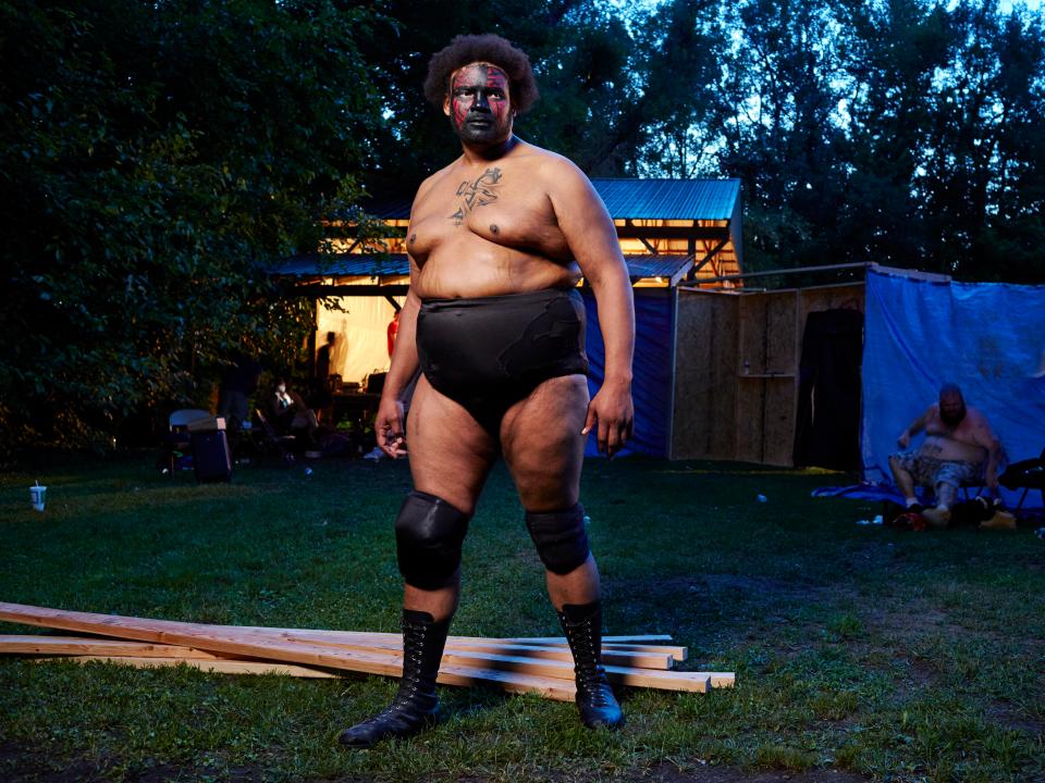  Wrestler Kongo Kong stands backstage at the death-match event