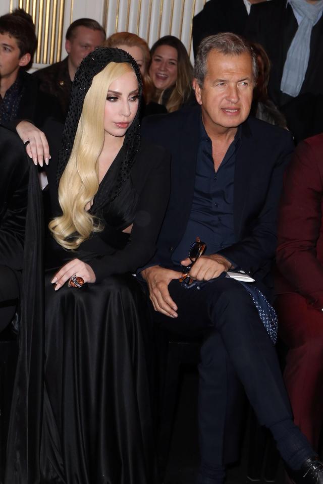  The royal and celebrity photographer is often seen on the front row of fashion shows