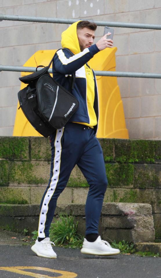 Jake practises his pout on the way to training