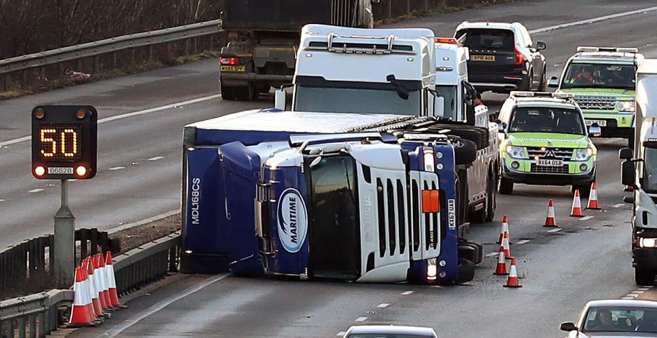 A lorry appears to have been blown over after winds reached speeds of 70mph