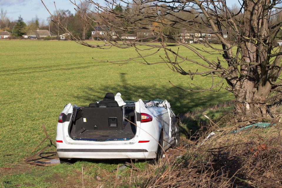 Picture shows the remains of a car after being hit by a tree near Waterbeach,Cambs