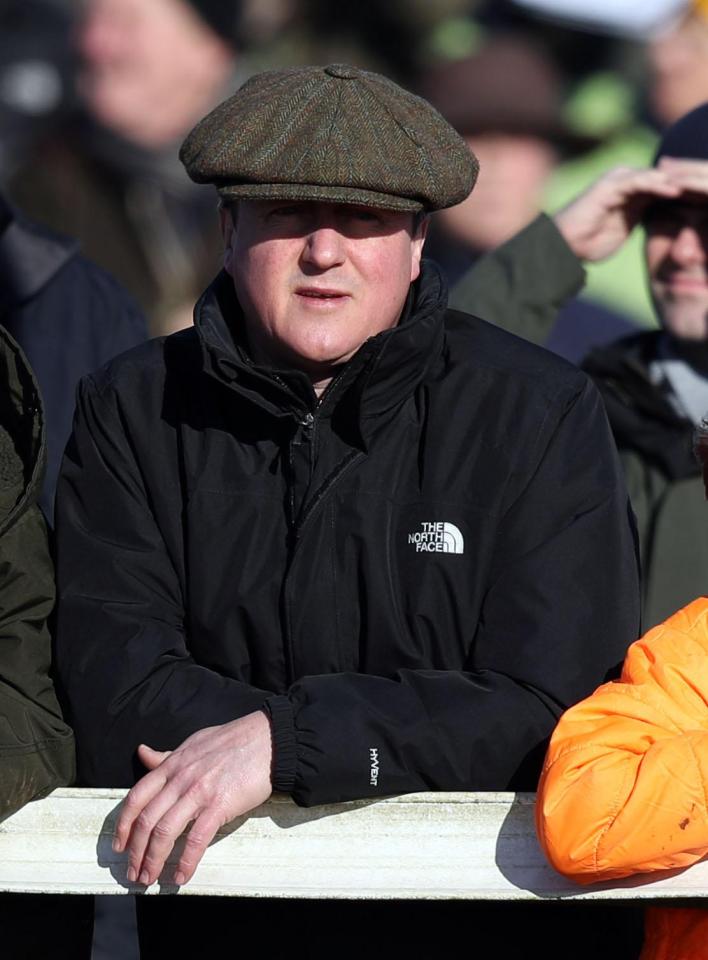  Cameron may be auditioning for a part on Peaky Blinders as he wears an oversized flat cap for a day at the races