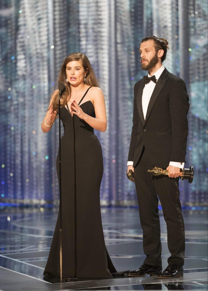  Rachel and fiance Chris Overton pick up the Oscar for Best Short Film