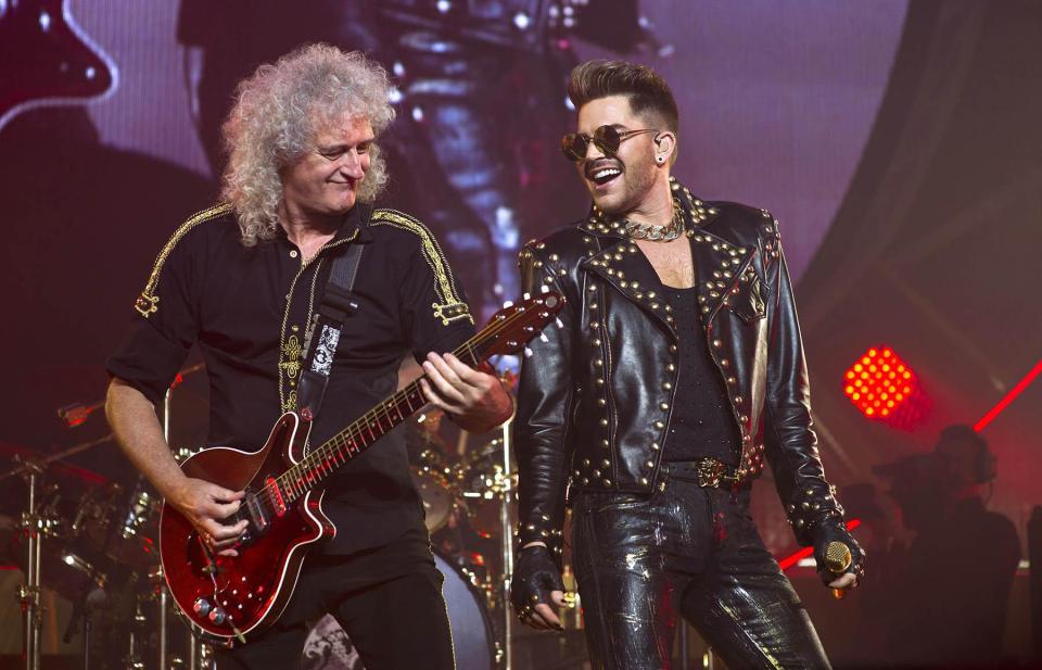 Adam, pictured performing with Brian May, has filled icon Freddie's shoes