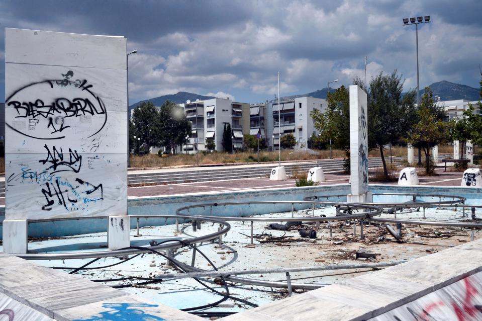  The remnants of Athens 2004 can barely be seen through the graffiti and rubble