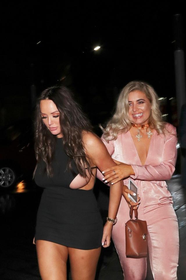 Charlotte nearly spilled out of her dress
