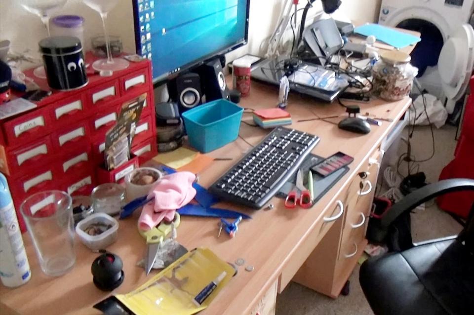  His desk is piled with rubbish as well as golf balls, an iPhone docking station and what looks to be a tub of dried up mushrooms