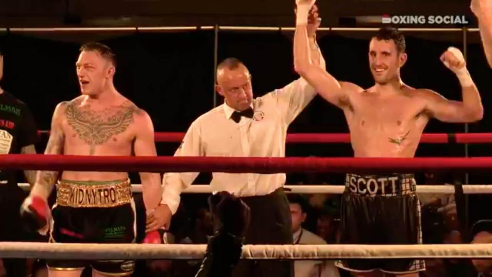  Westgarth holding his hand up in victory after a points win over Dec Spelman
