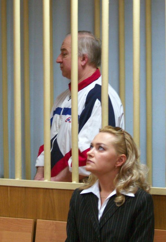 Skripal standing behind bars before being pardoned by then-President Dmitry Medvedev in 2010