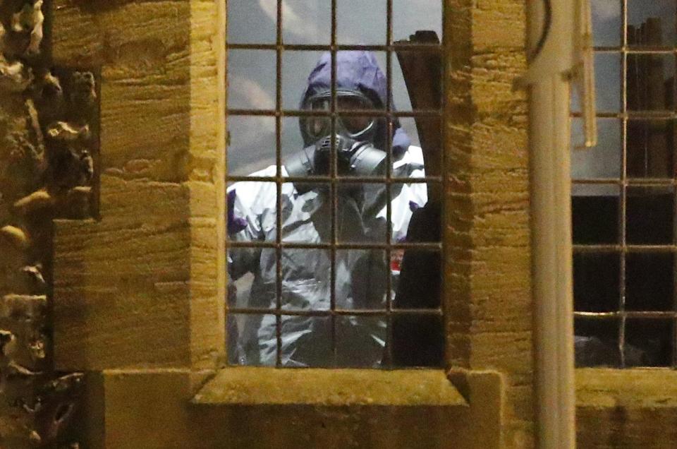  Officers wore protective suits to search inside The Mill pub