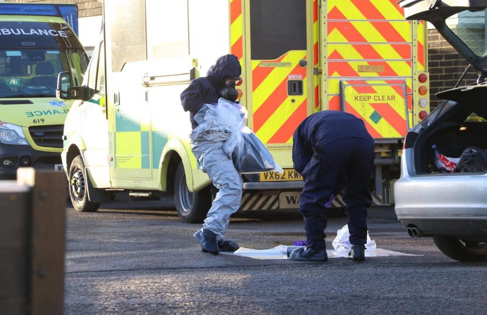  Forensics cops wearing protective gear scoured the Great Western Ambulance Service building
