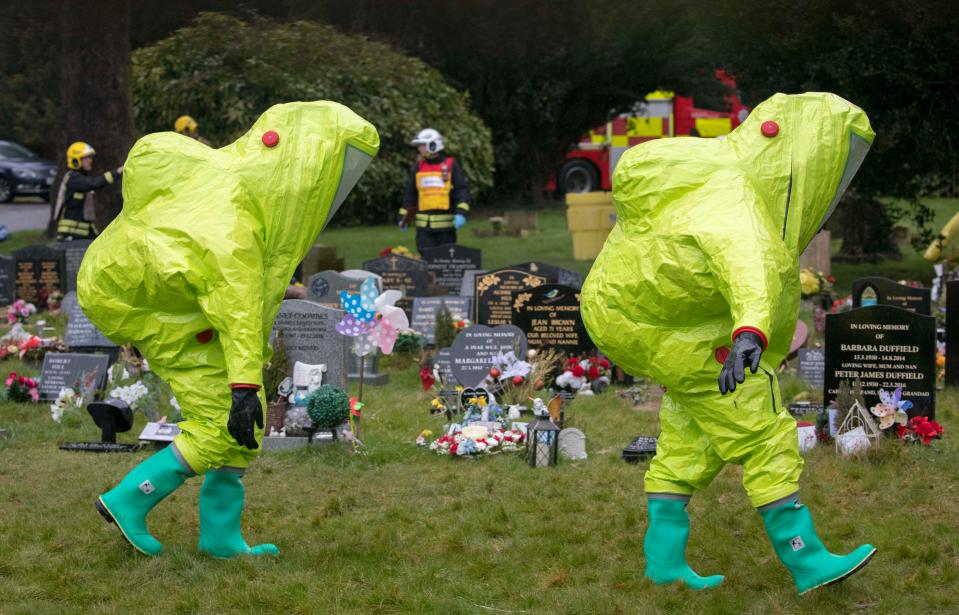  Fire officers in hazard suits placed a tent over the grave of poisoned ex-spy Sergei Skirpal's son