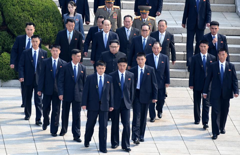 But for most of the trip the dictator was flanked by his personal bodyguard