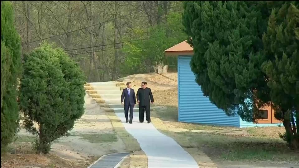 The leaders returned from their stroll together following the tree planting ceremony