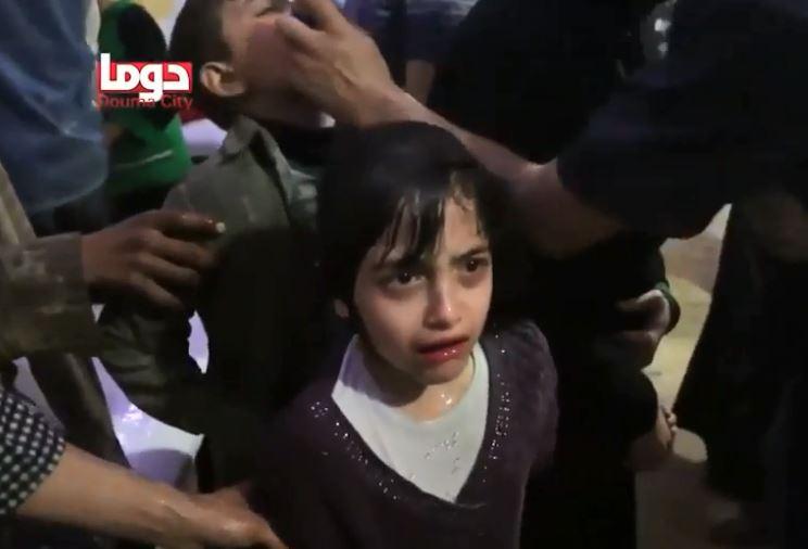  A little girl is left in shock as she receives emergency treatment