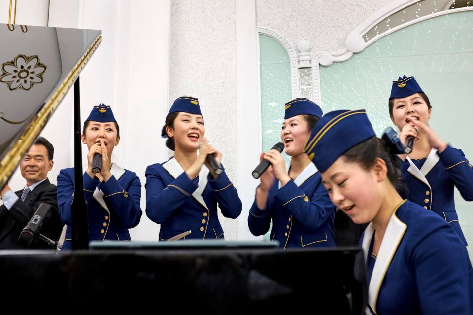  The airline stewardesses are chosen for their beauty and apparently their musical abilities
