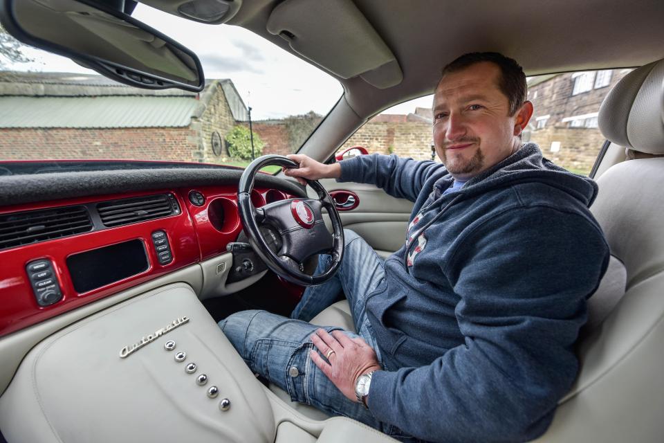  Cream interior is matched with the blood red paint job