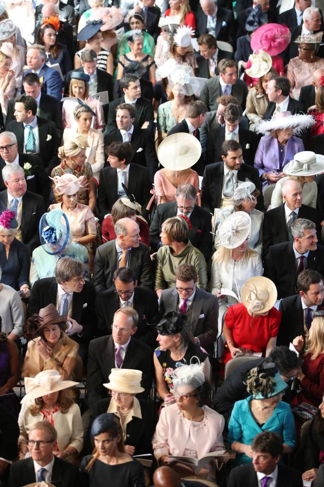 Rows of guests are eagerly awaiting the arrival of Meghan Markle