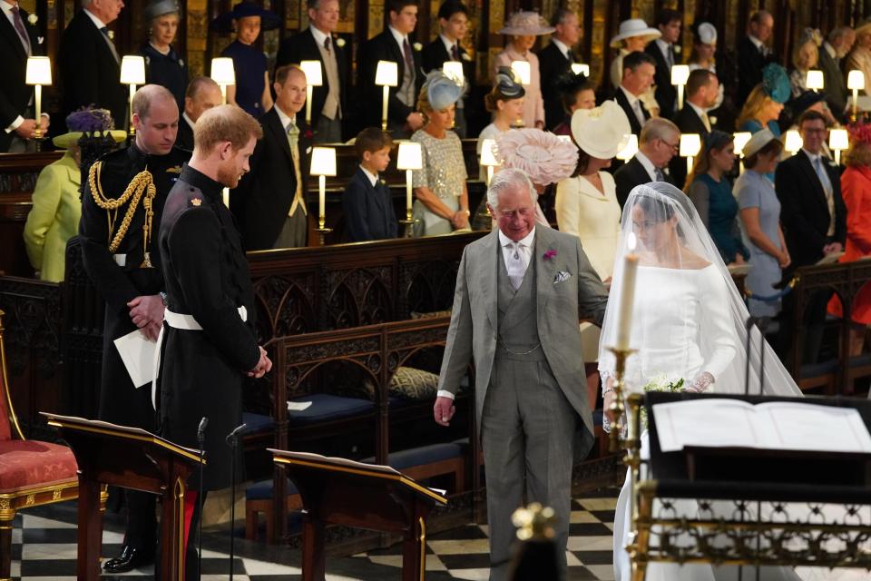 Prince Charles was by Meghan's side, with the actress' dad unable to attend