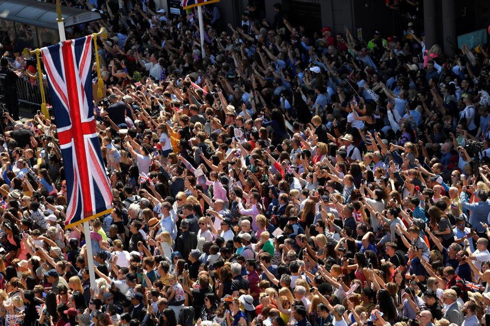 Hundreds of thousands of people have cheered the couple as they were driven around Windsor