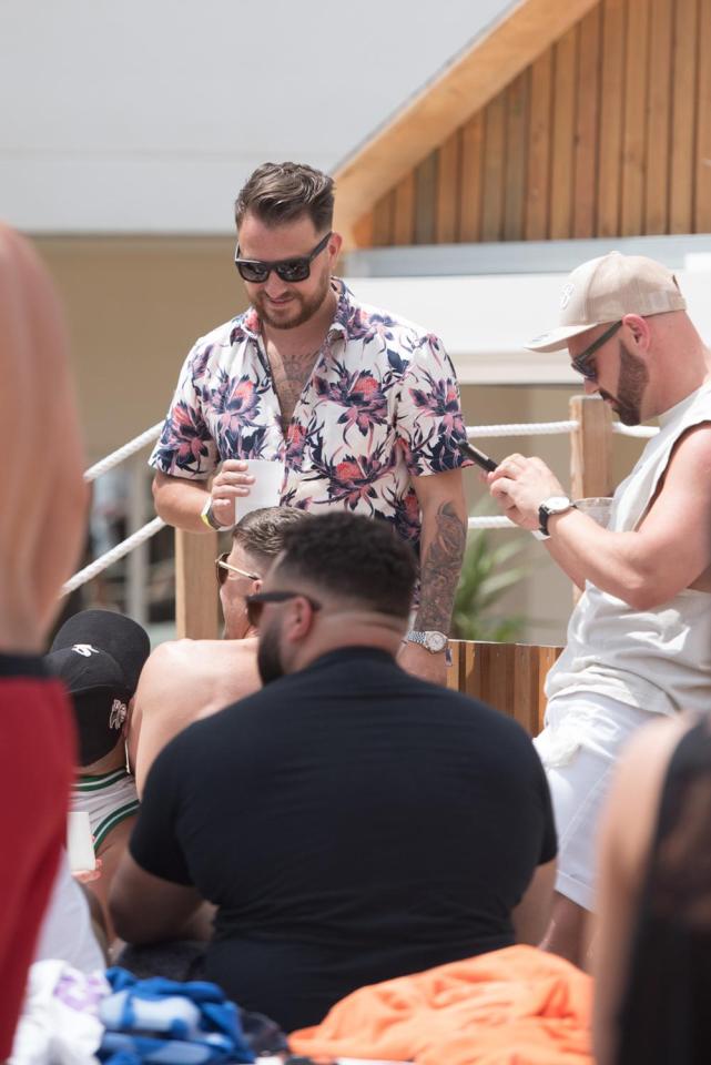  Both men wore bold summer clothes for the pool party