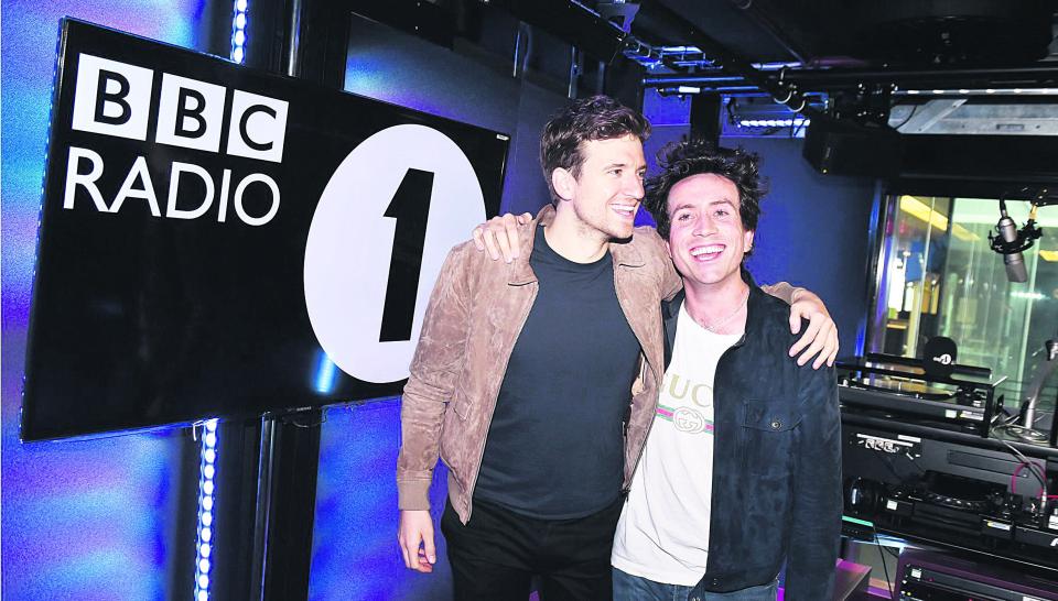 Grimmy and Greg James just after revealing they'd be swapping jobs
