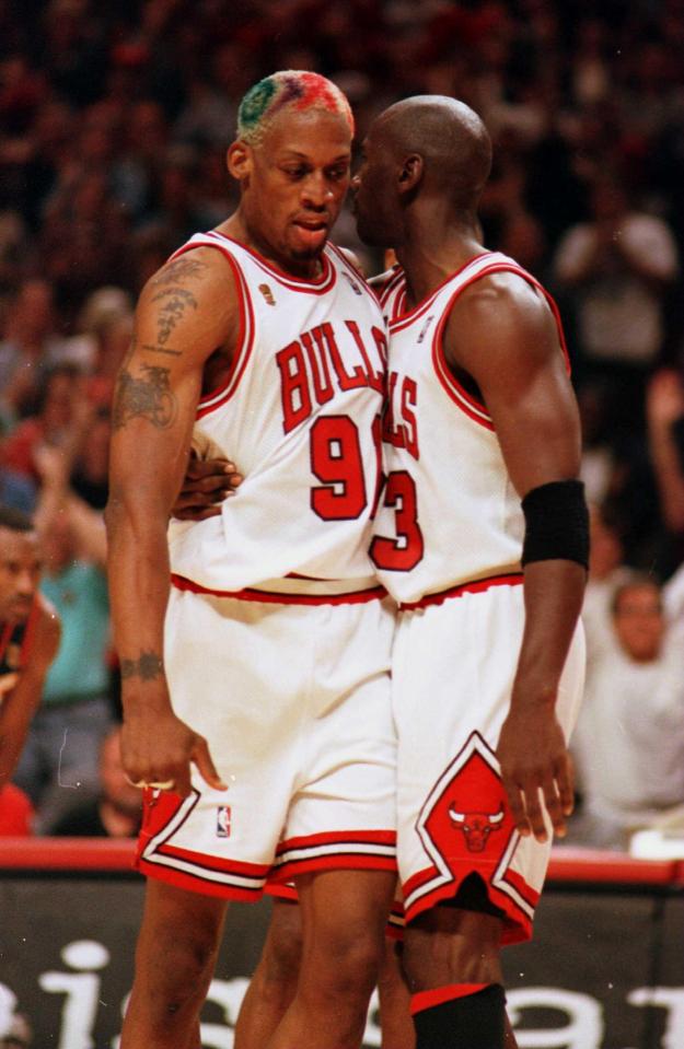  Rodman sporting one his trademark hairstyles while playing for the Chicago Bulls alongside Michael Jordan
