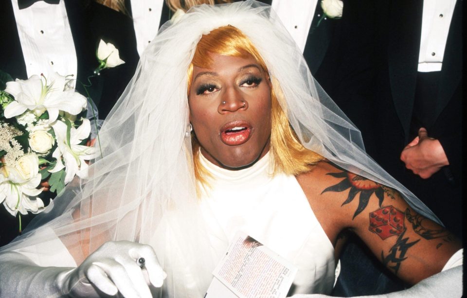  Rodman arrived in a horse-drawn carriage dressed in a wedding gown to launch his book 'Bad as I Wanna Be'