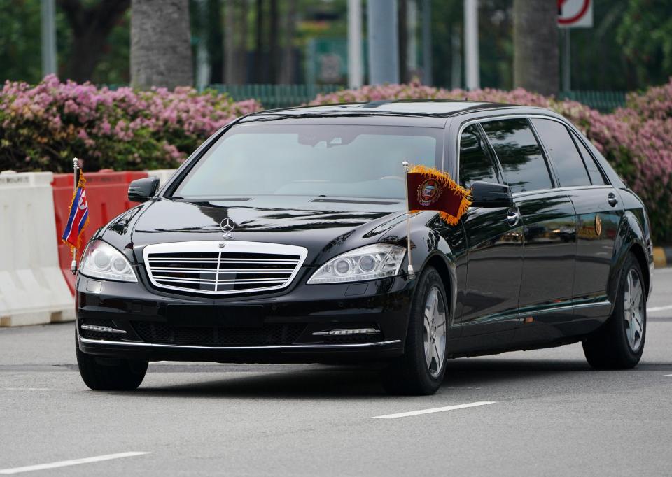  A car believed to be carrying Kim Jong-un drives through Singapore ahead of his meeting with Trump