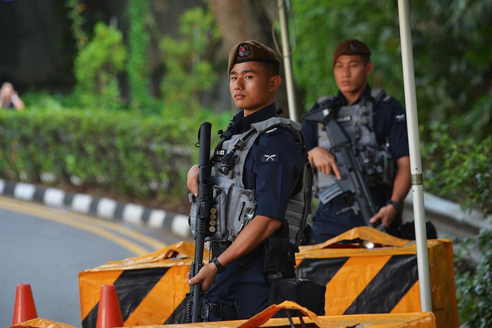  Machine-carrying cops seen near Kim's Singapore hotel