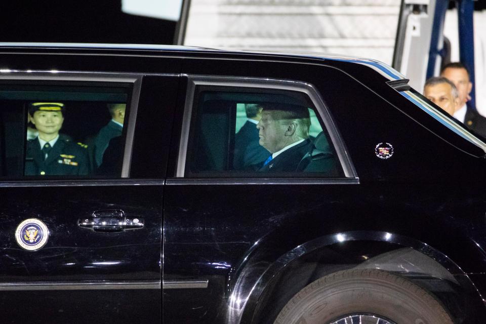  The Republican firebrand leaves the air base in a limo after flying in from the G7 summit in Canada