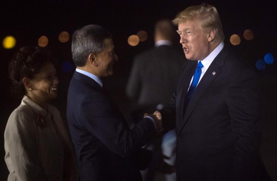  Trump is welcomed by Singapore's Foreign Minister Vivian Balakrishnan