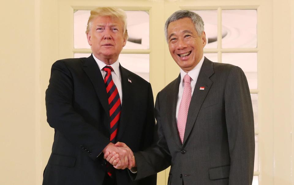  Trump meets with Prime Minister Lee at a working lunch