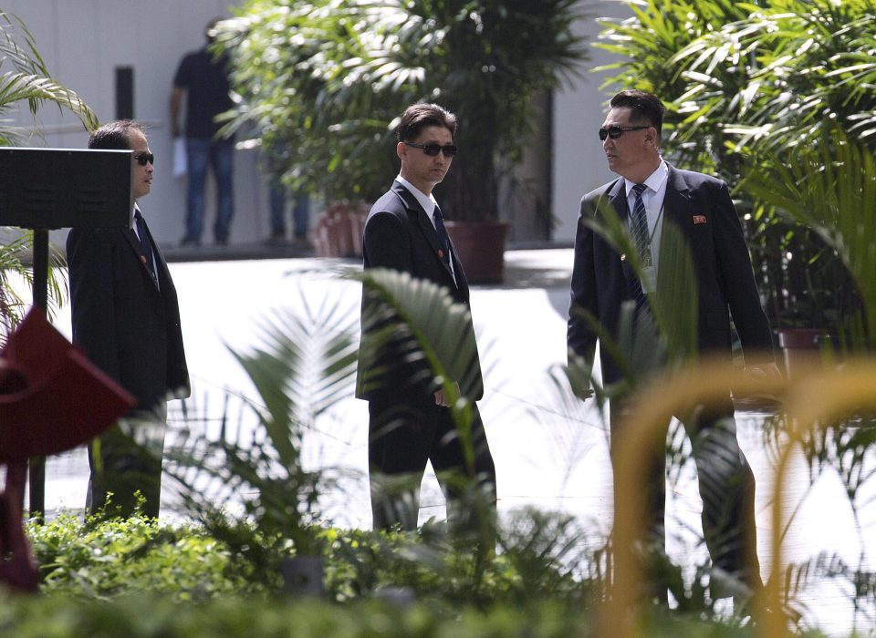 More eagle-eyed bodyguards lurk around the St Regis Hotel where Kim is staying