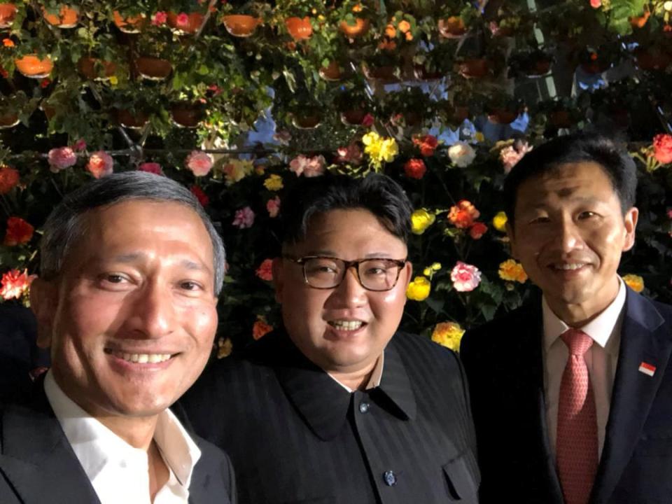 Kim Jong-un poses for a selfie with Singapore's Foreign Minister Vivian Balakrishnan and Education Minister Ong Ye Kung