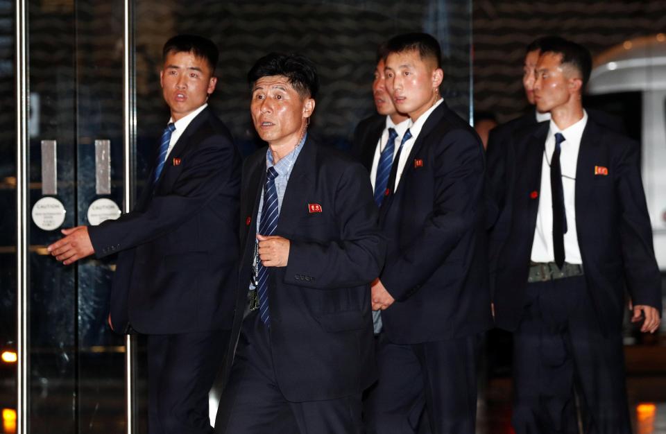 Kim's crew... the suited secret agents tasked with protecting their leader 