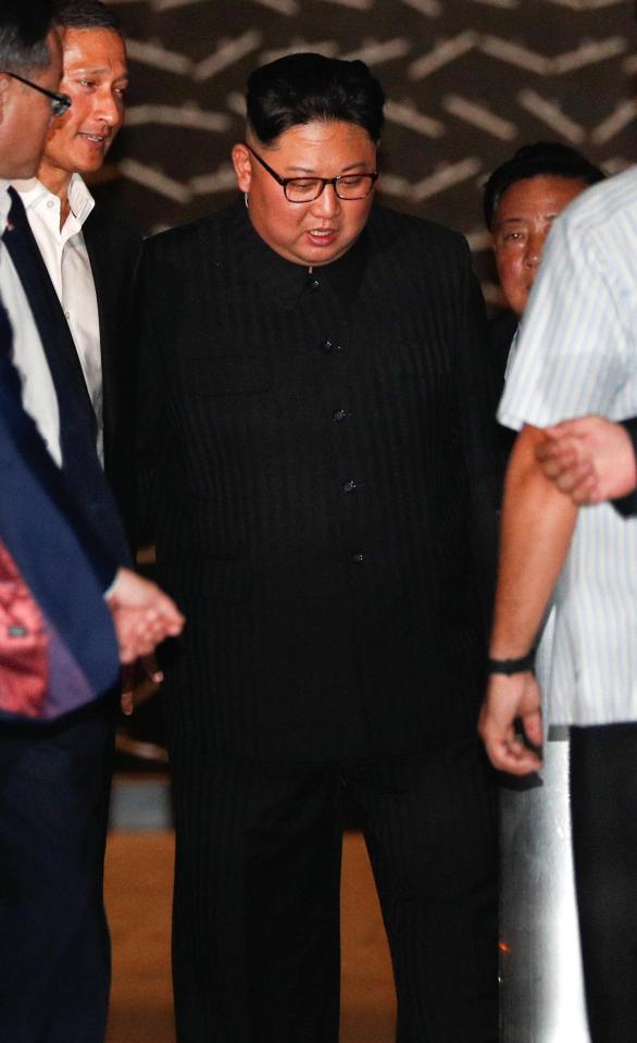 Kim Jong-un as he leaves his hotel in Singapore on the eve of the summit 