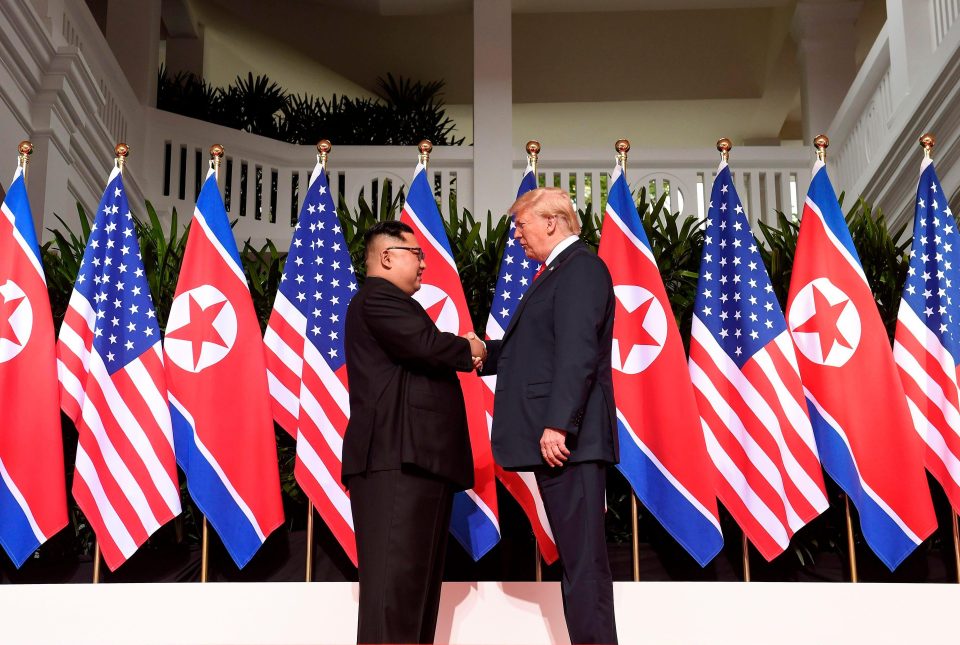  The world leaders share a historic handshake as they meet in Singapore