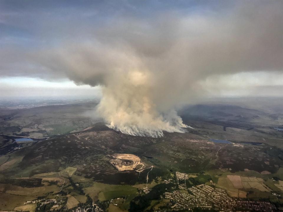  More than 30 homes were evacuated from Carrbrook, seen in the lower right of this image