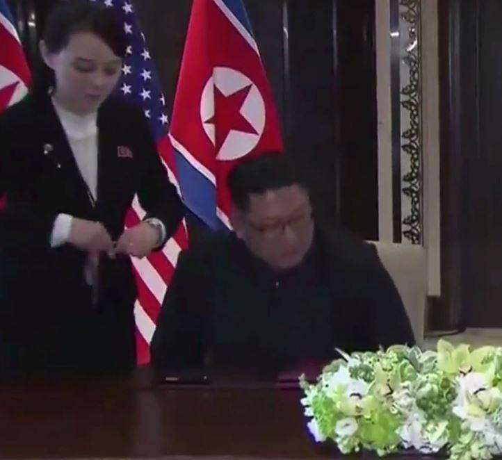 Kim Yo-jong then intervenes and hands Kim her own pen
