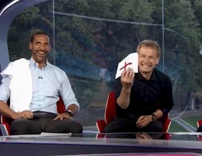 Klinsmann hilariously waved a card with the England flag on it as his fellow studio guests burst out laughing