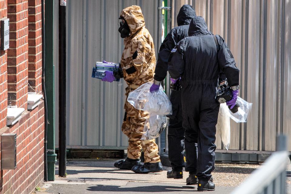  Emergency workers in protective suits search around John Baker House Sanctuary Supported Living after Dawn Sturgess and Charlie Rowley were exposed to the Novichok nerve agent