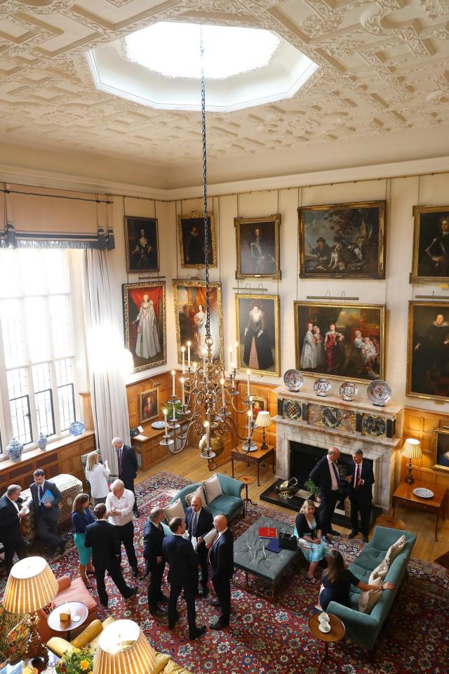  Ministers chatting in the Chequers drawing room - Chris Grayling is talking to Philip Hammond, David Lidington to Esther McVey and Karen Bradley to Caroline Nokes