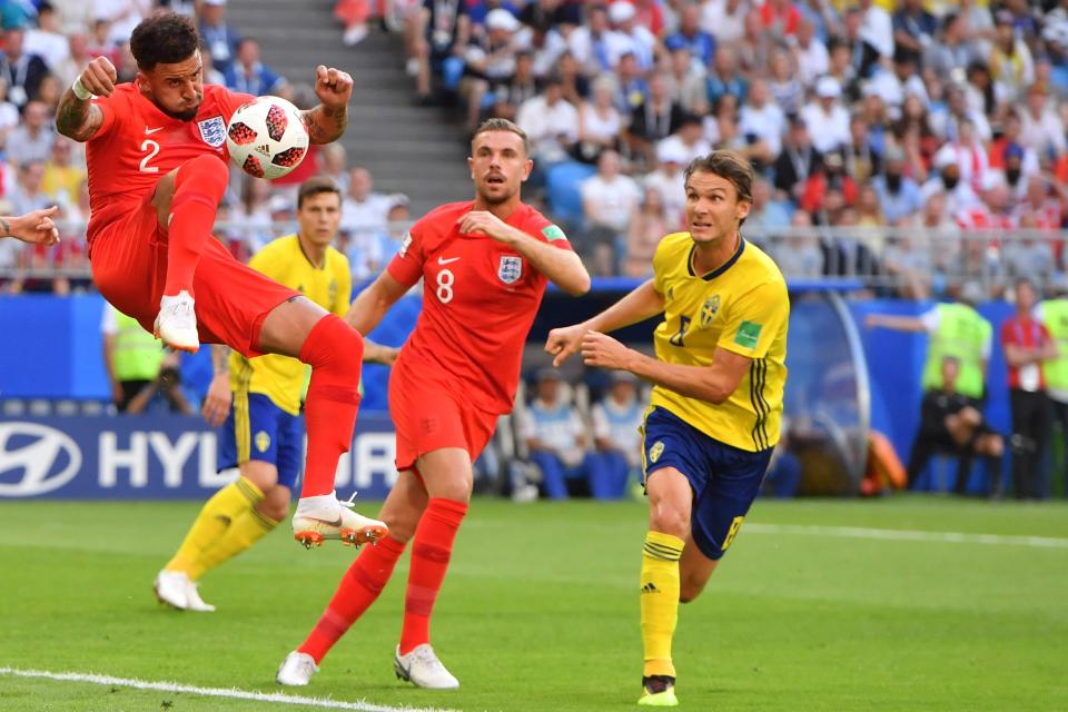 Kyle Walker leaps to control the ball as England tried to combat the defensive Swedish tactics